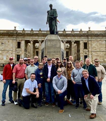 LEAD 40 poses with Simon Bolivar in Plaza de Bolivar in Bogota, Colombia. 