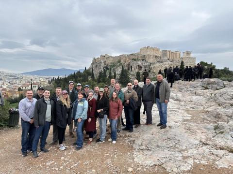 A group in front of the Parthenon.