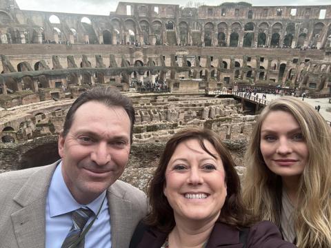 Luke Zangger, Amber Shane and Allissa Troyer pictured with the floor of the colosseum in the background. 