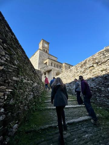 Fellows walking up the steep incline during the castle and museum tour. 